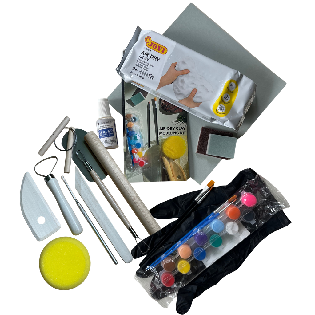 Art supplies including clay, tools, and paint on a white background