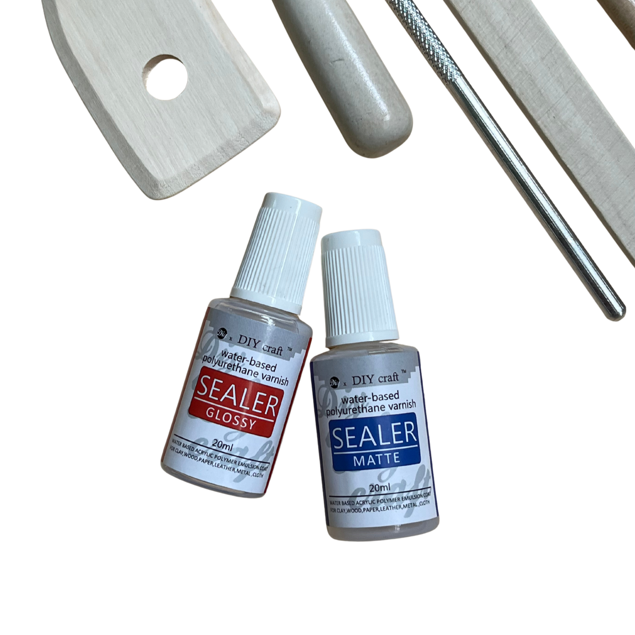Two bottles of sealer labeled 'Gloss' and 'Matte' with tools on a white background.